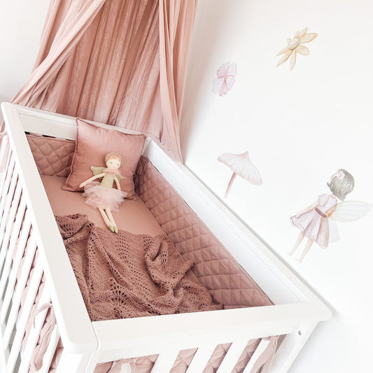 Inside view of Contemporary cot with mattress in newborn position