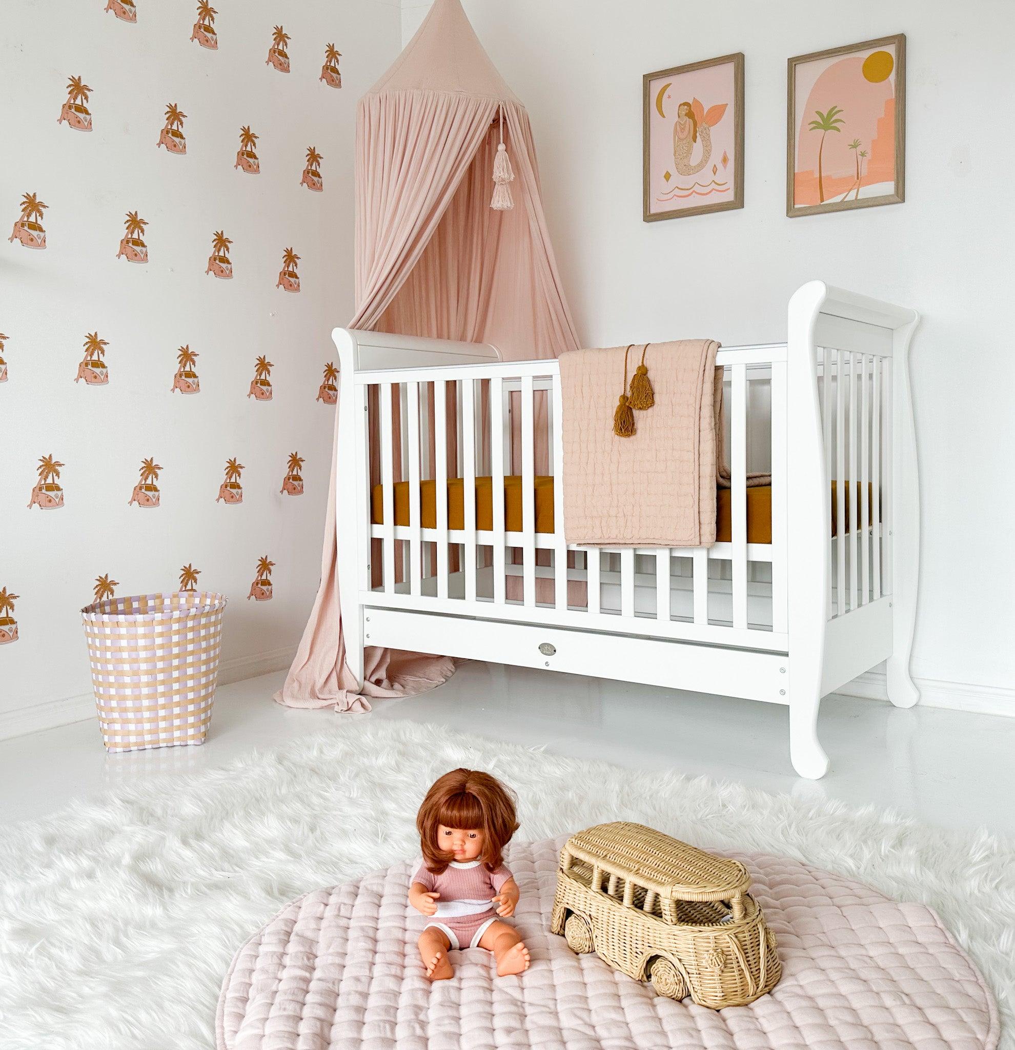 Nursery room with a white crib
