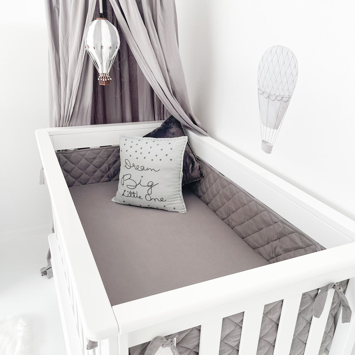 Inside of Contemporary cot showing innerspring cot mattress