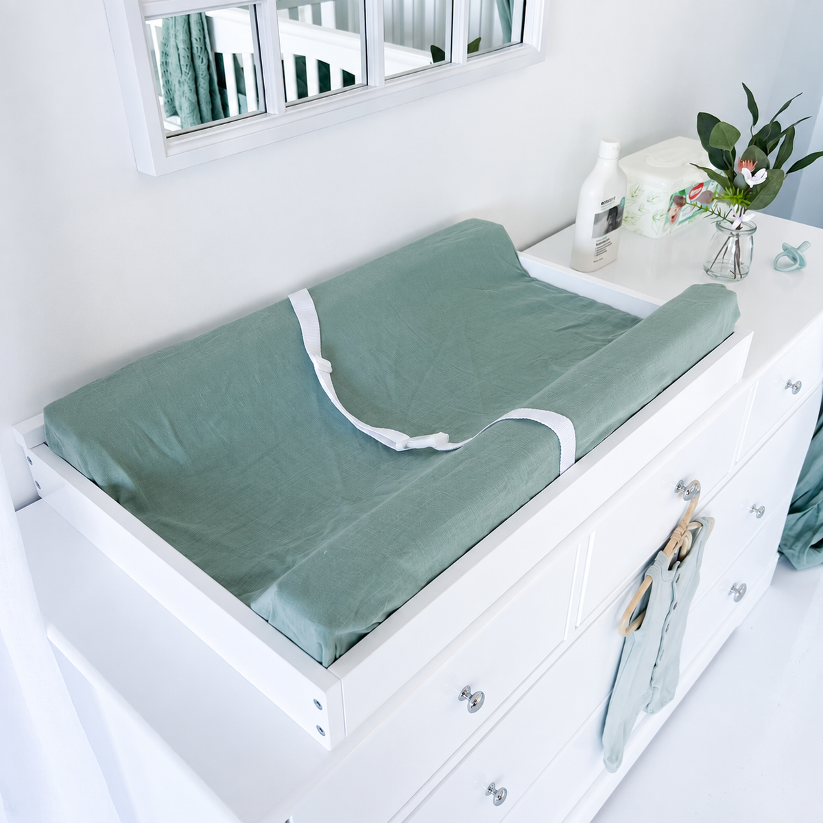 High-angle view of Heritage seven-drawer dresser with centred silver knobs